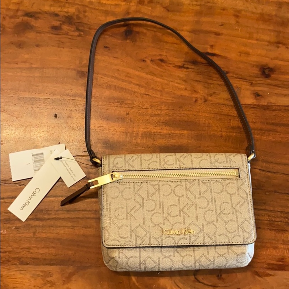 New Calvin Klein signature purse